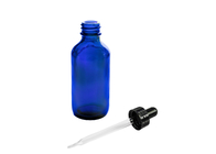 Botellas de aceite esencial vacías azules que almacenan las sustancias químicas de la química de los perfumes