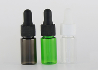 Botellas de aceite esencial vacías de cristal no que se escapan la opción del multicolor con la muestra
