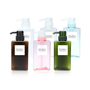 Embalaje de champú PETG de plástico vacío y transparente de color ámbar