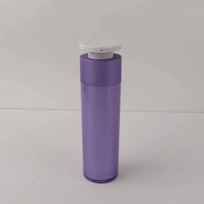 Botella de plástico púrpura para dispensadores de cosméticos con bomba de presión blanca