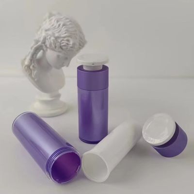 Botella de plástico púrpura para dispensadores de cosméticos con bomba de presión blanca