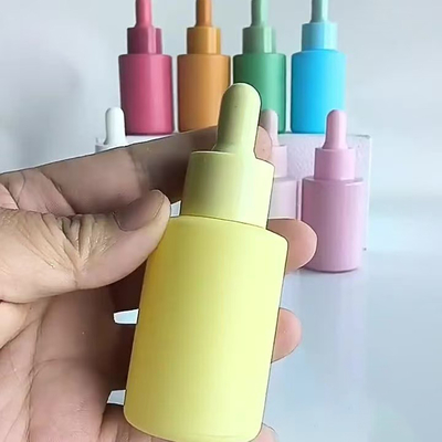 Botella de aceite esencial color Macaron de 30 ml con bomba de plástico PP y material de vidrio