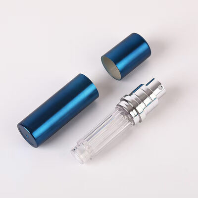 Botella pulverizadora de perfume portátil de aluminio rosa de lujo con anillo metálico