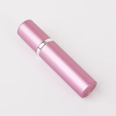 Botella pulverizadora de perfume portátil de aluminio rosa de lujo con anillo metálico