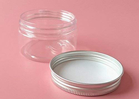Tarros cosméticos vacíos de los envases del ANIMAL DOMÉSTICO plástico con la tapa de aluminio de plata