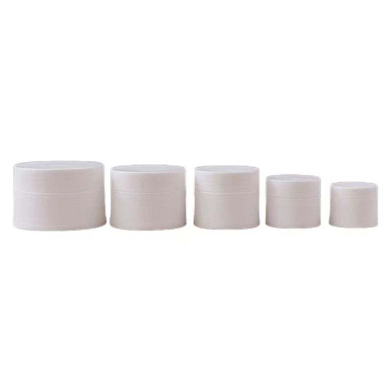Jarrón de crema cosmética de plástico de 30 ml 50 ml 100 ml de ámbar negro Pp con tapa blanca y negra