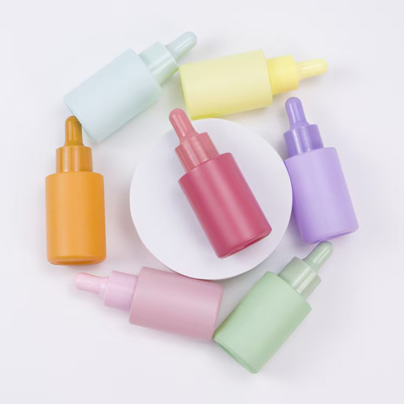 Botella de aceite esencial color Macaron de 30 ml con bomba de plástico PP y material de vidrio