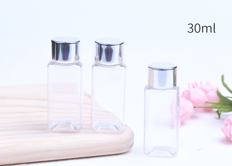 Envases cosméticos del plástico transparente, botellas plásticas cuadradas con las tapas de aluminio